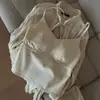 Camisola de lino blanco sin espalda con sujetador integrado para mujer, top de tirantes fino y transpirable para verano, adecuada para usar debajo de camisas.