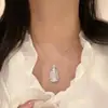 Colar Circular de Pedra Olho de Gato Levemente Luxuoso, Corrente para Clavícula para Mulheres com um Toque de Alto Padrão, Acessório de Joia com Pingente de Design Doce
