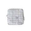 Bolsa de maquiagem quadrada listrada minimalista para estudantes, bolsa portátil para armazenamento de absorventes higiênicos, porta-fones de ouvido com laço para mulheres