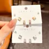 Pendientes de plata de ley S925 con diseño de nicho avanzado y combinación de piedras de ojo de gato geométricas pequeñas, sencillos y exquisitos.
