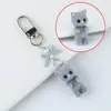 Colección de Llaveros de Peluche de Animales de Dibujos Animados con Lazo Lindo en Varios Colores y Muchos Colgantes para Elegir
