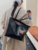 Venta al por mayor Envío directo Bolso de hombro individual para mujer de gran capacidad 2026 Otoño Nuevo Bolso tote de moda Bolso de trabajo Versátil a la moda