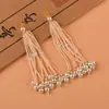 Estilo nacional borla de cuentas de arroz flecos brocado Song accesorios bolsa colgante accesorios hechos a mano con cuentas adornos colgantes cuentas de madera