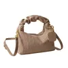 Bolso de mano vintage de rayas verticales transfronterizo para mujer, nueva moda de invierno 2025, bolso versátil de hombro y cruzado para mujer, en stock