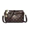 Bolsa feminina com textura de couro macio 2026 nova moda vintage bolsa para mãe de meia-idade bolsa transversal feminina multicamadas de alta qualidade