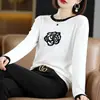 Camiseta de punto jacquard romántica nueva de primavera para mujer, top elegante de manga corta con bloques de color, nuevo color de camelia