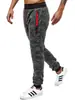 Novedad Moda Masculina Cintura de Cuerda Color Sólido Bolsillo con Cremallera Tela de Copo de Nieve Casual Pantalones Casuales Deportivos para Hombre