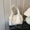 Bolsa Grande de Couro Encerado Versátil para Mulheres 2026 Nova Tendência Textura Cool Bolsa de Ombro Tote Bolsa de Ombro Popular para o Início da Primavera Bolsa para o Dia a Dia