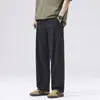 Oferta especial, artículo de alto volumen, nuevo modelo 2026, pantalón de traje negro para hombre, pantalones rectos de pierna ancha holgados de verano, otros artículos de moda