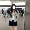 Camiseta de manga larga a rayas retro estilo coreano, tipo dos piezas, para mujer, modelo nuevo primavera y otoño 2026, dulce y picante, entallada a la cintura, corte slim