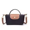 Bolsa Pequeña de Mano Versátil Casual de Moda de Venta Caliente al por Mayor para Viajes Diarios Color Bloque Tela de Nylon Bolso Cruzado para Mujer