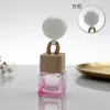 Venta al por mayor del fabricante 8ML botellas vacías cuadradas con tapa de colores, disponibles en todos los colores, botellas de vidrio para colgar en el coche, botellas de perfume de colores