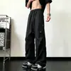 Pantalones cargo de retazos plisados estilo americano para hombre, pantalones casuales rectos holgados de moda para otoño, pantalones de paracaidista de pierna ancha para jóvenes