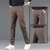 Calça Casual Elástica Slimming para Jovens Homens Primavera/Outono 2026 Calça Elástica Versátil Roupas Masculinas da Moda