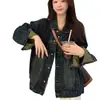 Chaqueta de mezclilla retro estilo Hong Kong para mujer, nuevo modelo primavera y otoño 2025, corte holgado, adelgazante, lavada y desgastada, top de manga larga