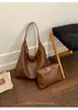Fábrica de origen de comercio exterior transfronterizo estilo universitario retro 2026 nuevo bolso de hombro tote Maillard