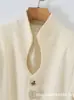 Moda feminina transfronteiriça: Nova coleção de outono com um blazer de estilo francês, decote V com botões, cintura ajustada e elegante, apropriado para o trabalho