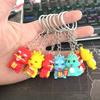 Nuevo colgante de huevo de dibujos animados para fiesta, muñeco 3D, mini mochila escolar, llavero pequeño y bonito.