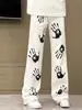 Jeans Acampanados Estilo Americano para Hombre Otoño 2025 Pantalones con Estampado de Palma Marca de Moda Calle Fresca High Street Pantalones Largos