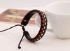 Pulsera boutique al por mayor joyería de moda japonesa y coreana pulsera tejida de cuero multicolor venta de comercio exterior fábrica ventas directas