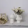Jarrón de Cerámica Abstracto Creativo Estilo Minimalista Moderno Decoración para el Hogar Dormitorio Mesita de Noche Escritorio Adorno Decoración Suave Recipiente para Flores