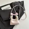 Bolso mini de diseño de nicho dulce y lindo para mujer, bolso de luna 2026, bolso cruzado de PU, bolso de mano accesorio para padres e hijos