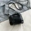 Bolsa de mão popular de nicho com superfície macia 2026 nova moda retrô elegante bolsa de ombro único bolsa transversal bolsa elegante