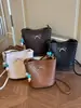 2026 Verano Nuevo Modelo Patrón Tejido Diseño de Nicho Bolso de Mano para Mujer Bolso Cubo de Color Sólido de Alto Valor Bolso de Hombro Único