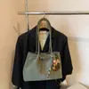 Bolso de ante coreano para la axila para mujer 2025 Nuevo de moda Otoño e Invierno Bolso tote retro Simple de gran capacidad Bolso para el día a día