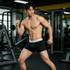Entrenamiento Deportivo Transpirable Secado Rápido Deportes al Aire Libre Fitness Anti-Desgaste Pierna Maratón Correr Longitud Media Ropa Interior Elástica para Hombre