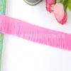 Venta al por mayor del fabricante Yiwu Trading presenta nuevos accesorios de encaje con flecos, accesorios para la ropa y encaje de borlas coloridas para cortinas