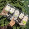 Calcetines deportivos de algodón para mujer Hongmuyuan 26, nuevos para otoño e invierno, frescos y elegantes, en un hermoso color marrón, disponibles para venta al por mayor.