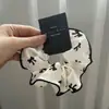 Anel de Cabelo Listrado de Cabeça de Bola Intestino Grosso Celebrante da Internet 2025 Novo Estilo Corda de Cabelo para Rabo de Cavalo Alto Acessório de Cabelo Feminino Corda de Cabelo