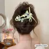 Pinza para el Cabello Estrella Nueva 2026 para Mujer, Pasador de Lujo Ligero de Gama Alta, Pinza Retorcida de Volumen Completo para la Parte Posterior de la Cabeza, Accesorio de Moda para el Cabello al por Mayor