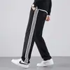 Conjunto Esportivo da Moda para Primavera e Outono para Homens e Mulheres, Roupa Esportiva Casual de Três Listras, Roupa de Corrida Transfronteiriça, Conjunto de Duas Peças Cardigã e Calça Longa