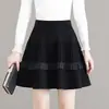 Falda midi plisada de línea A personalizada, nueva moda primavera/otoño, holgada, adelgazante, cubre caderas, elegante, ajustada a la cadera, corta