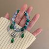 Pulsera de loto estilo chino derivada de bricolaje con la misma impresión de nicho de temperamento de alto valor de belleza pulsera antigua avanzada para novia