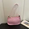 Bolsa feminina de verniz brilhante com bolinhas de nicho, nova moda 2026, bolsa versátil para o dia a dia, bolsa de ombro e sob o braço super popular