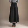 Saia de tricô patchwork casual da moda para mulheres, nova saia de cintura alta em linha A emagrecedora para outono e inverno de 2026, saia elegante com barra larga
