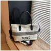 Bolso de Lona Rayado Transfronterizo para Mujer, Gran Capacidad, Nuevo Bolso Cruzado Versátil Otoño e Invierno 2026, Bolso de Mano Casual para Estudiantes Universitarios
