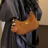 Bolso bandolera para mujer de nuevo diseño retro para debajo del brazo, otoño e invierno, de un solo hombro, terciopelo con patrón de diamantes, tacto de gamuza, bolso de mano con colgante 2026