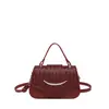Bolsa de design de nicho feminina 2026 outono nova bolsa de mão retrô popular bolsa de ombro único transversal bolsa sela