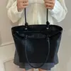 Bolso de mano tejido de nicho transfronterizo para mujer, nuevo diseño de moda 2026, para el trabajo, simple, gran capacidad, bolso de mano, bolso de hombro