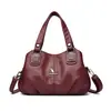 Bolso de maternidad portátil de moda 2024, de aspecto elegante, textura suave, bolso de hombro cruzado con múltiples compartimentos