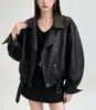 Nueva chaqueta de otoño e invierno estilo coreano, holgada, de cuero PU, doble botonadura, cuello de solapa de motociclista, top de moda para mujer estilo europeo y americano