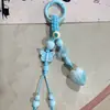 Llavero de Bolsa de Cerámica Tejida a Mano de Jingdezhen, Colgante Creativo de Anilla de Resorte, Venta al por Mayor de Pequeños Regalos Culturales y Creativos