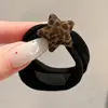 Coloridos coleteros de nuevo estilo 2026, versátiles y dulces, con accesorios de M&M's, anillos de toalla, diseños de dibujos animados y un estilo fresco y lindo, perfectos para accesorios para el cabello de niños