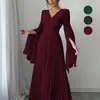 Vestido Largo de Cintura Alta Nuevo Transfronterizo Europeo y Americano Exportación Sexy de Manga Larga con Escote en V Profundo y Diseño de Manga de Campana Plisada