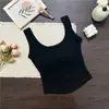 Camisola para chica atractiva con copas de sujetador incorporadas, adecuada tanto para llevar debajo como por encima, hermoso diseño de espalda, top básico de una pieza de color liso, corto, ajustado