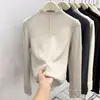 Top de capa base de alta gama con bordes rizados, cuello semi-alto, suéter de punto elegante en capas para mujer para Primavera, Otoño e Invierno 2026